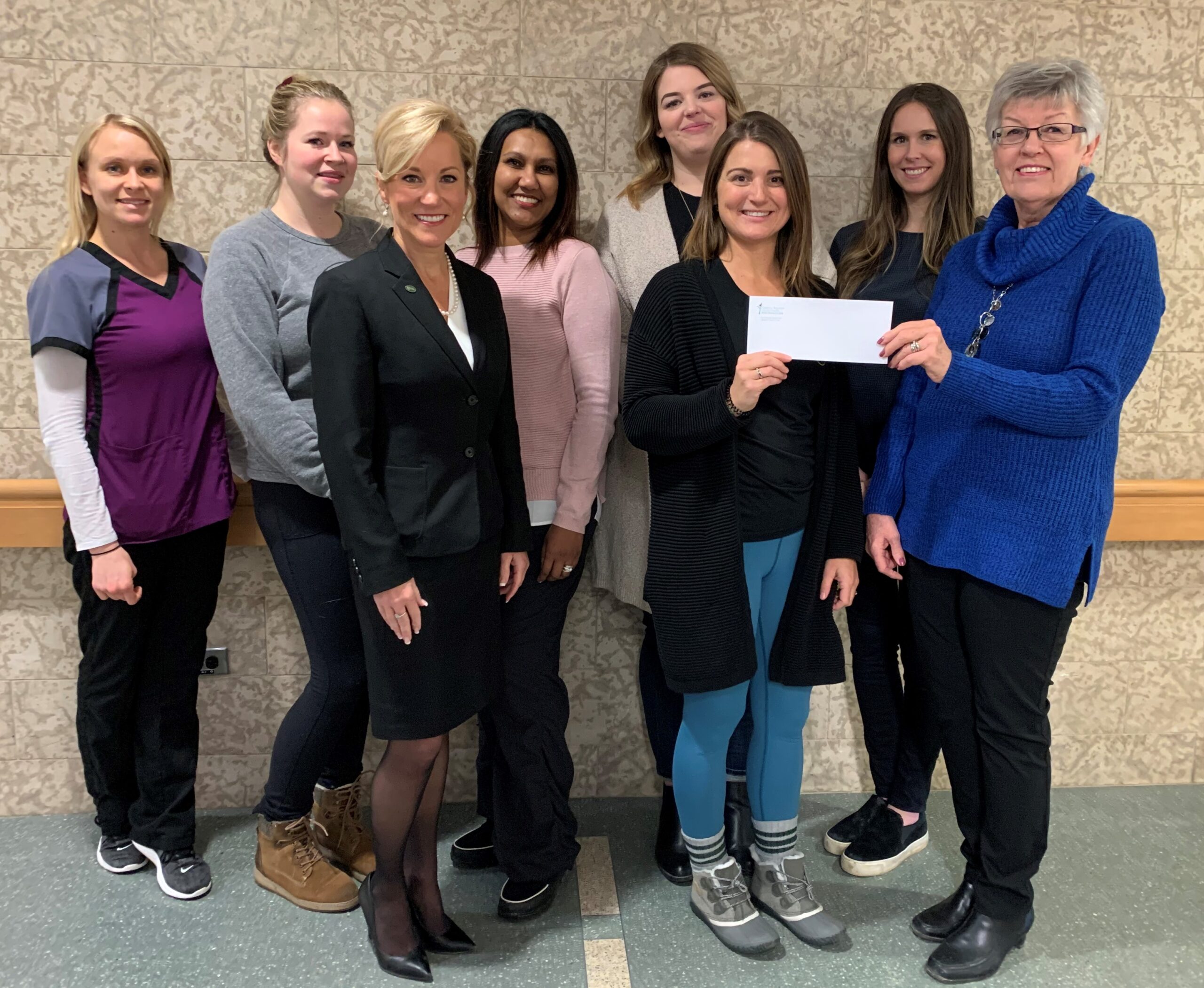2019 Gala Committee members present proceeds to BRHC Foundation