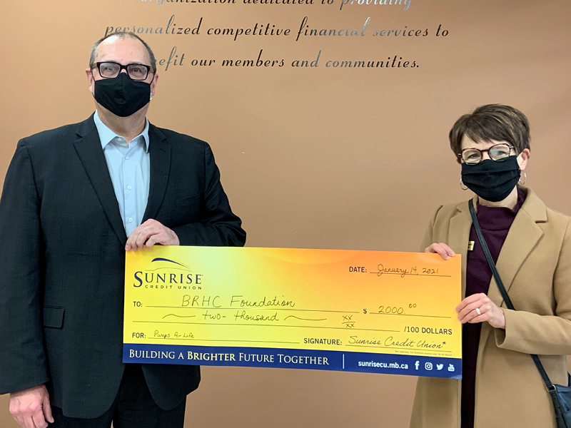 Sunrise Credit Union cheque presentation - Joanne Campbell, BRHC Foundation Vice Chair, accepting the cheque from Mike Brolund, Sunrise Credit Union Branch Manager